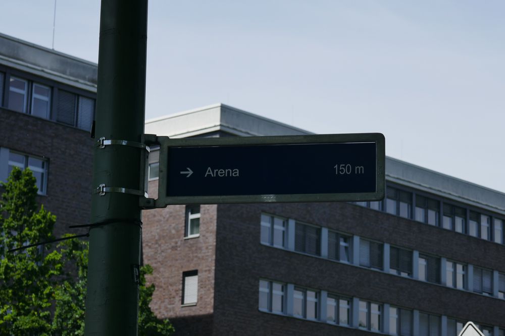 Picture of signage that points towards the
Arena